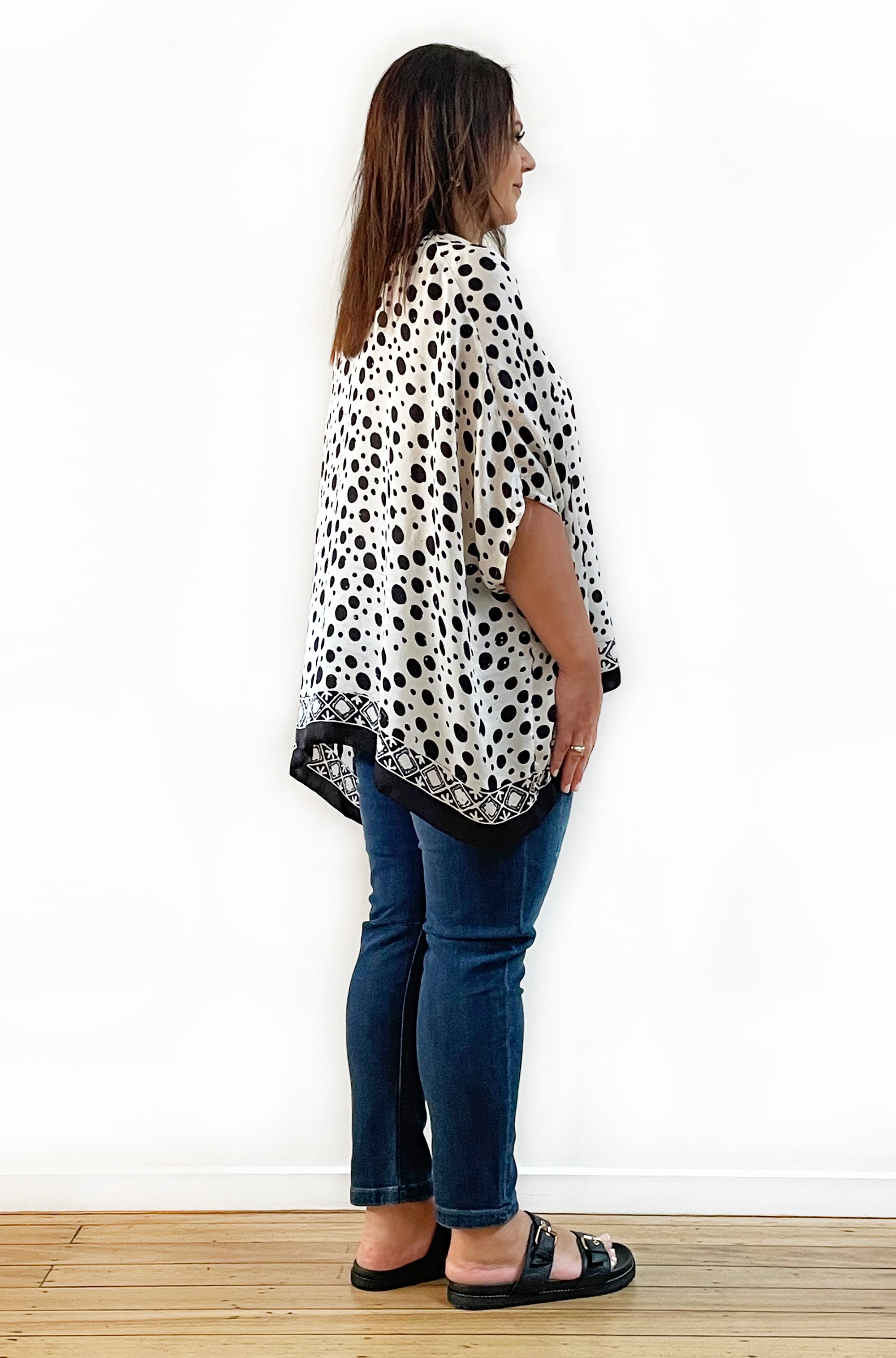 SILK PONCHO IN BLACK AND IVORY SPOT PRINT