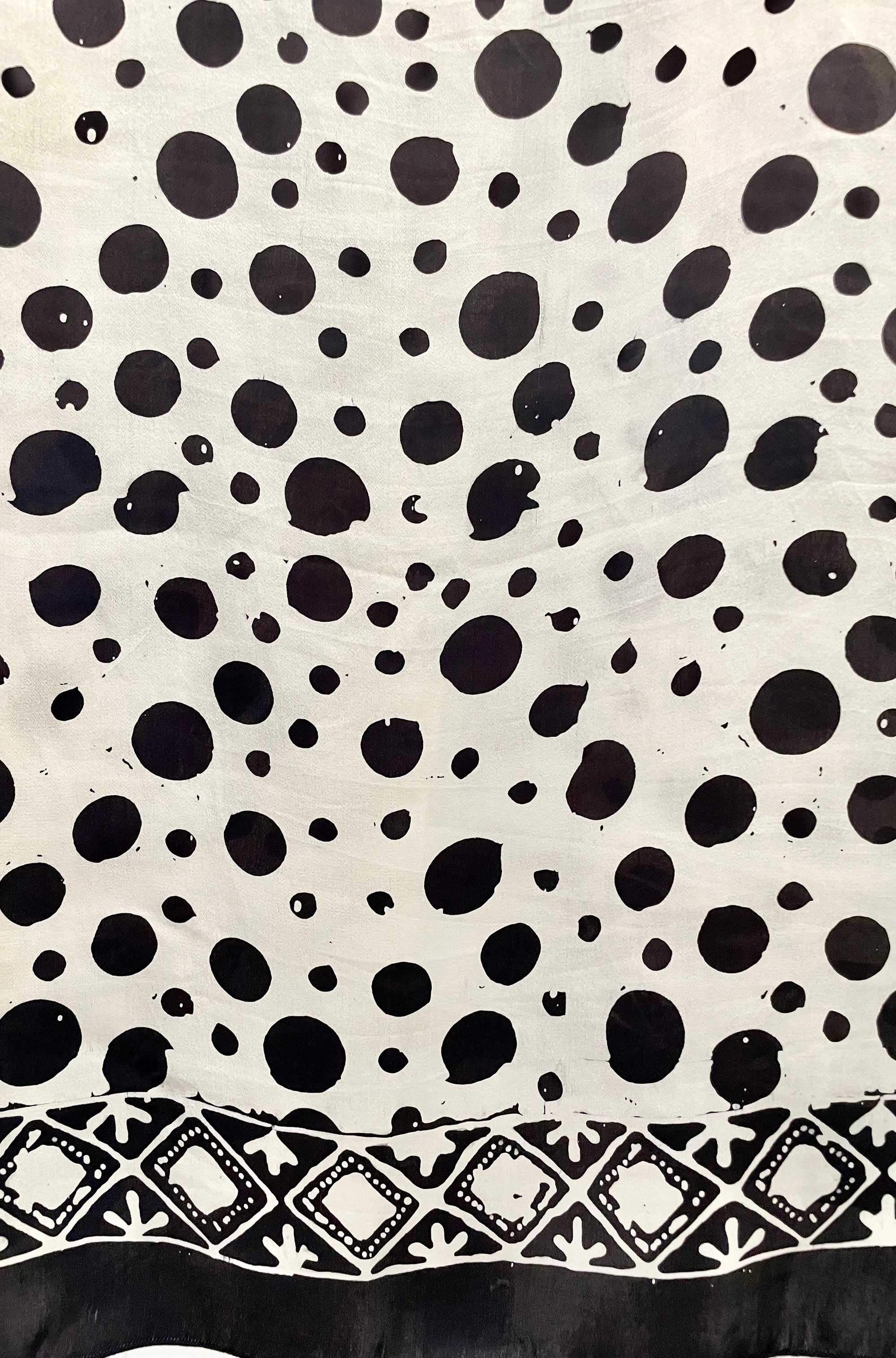 SILK PONCHO IN BLACK AND IVORY SPOT PRINT