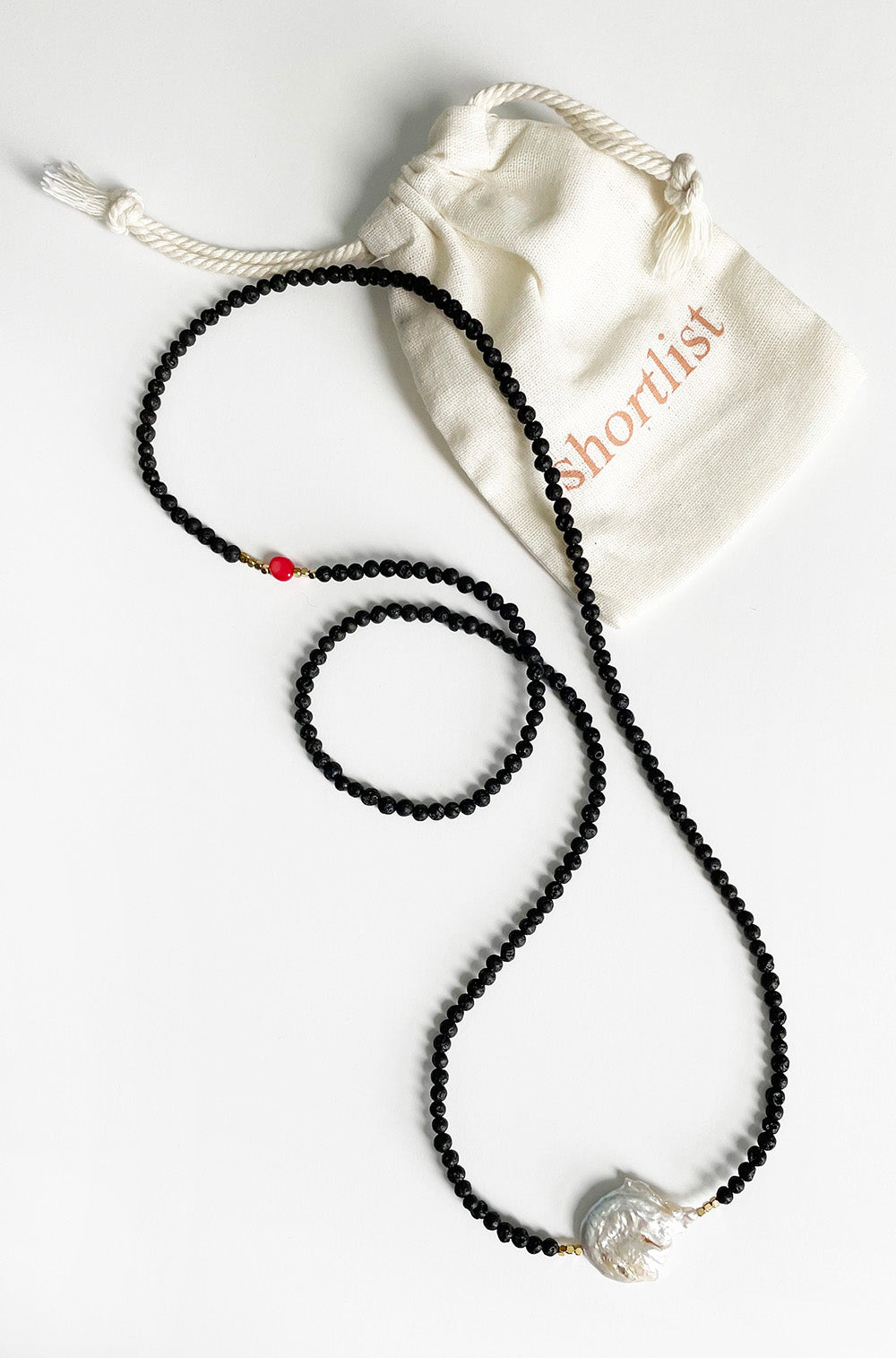 SINGLE FRESHWATER PEARL AND LAVA STONE LONG NECKLACE