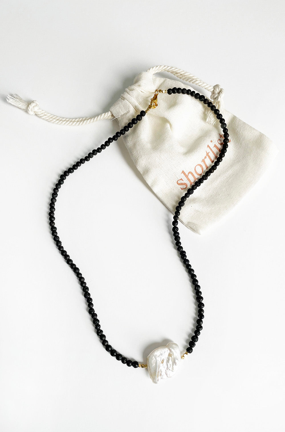 SINGLE FRESHWATER PEARL AND LAVA STONE NECKLACE
