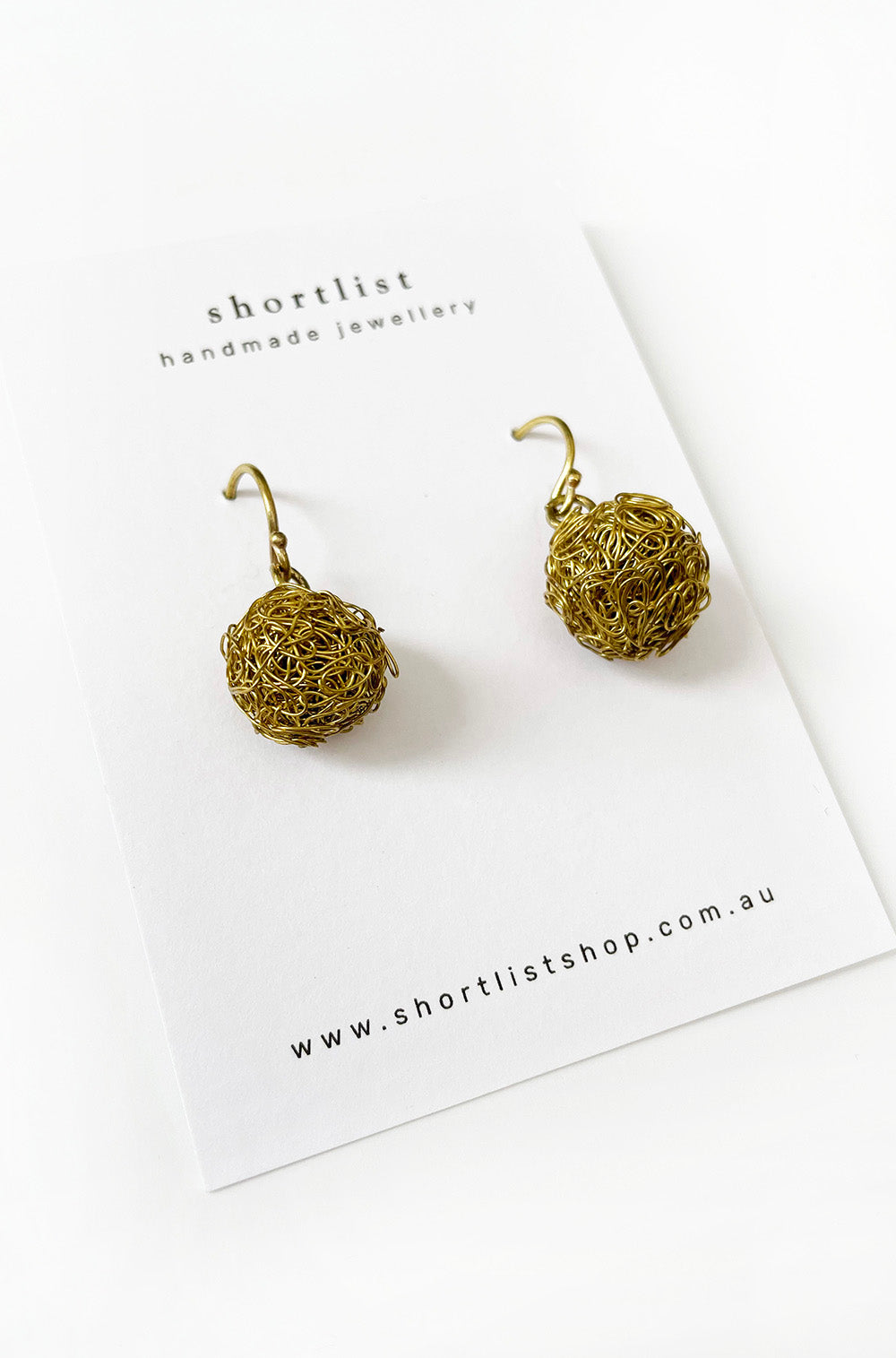 SMALL WIRE BALL EARRINGS BRASS