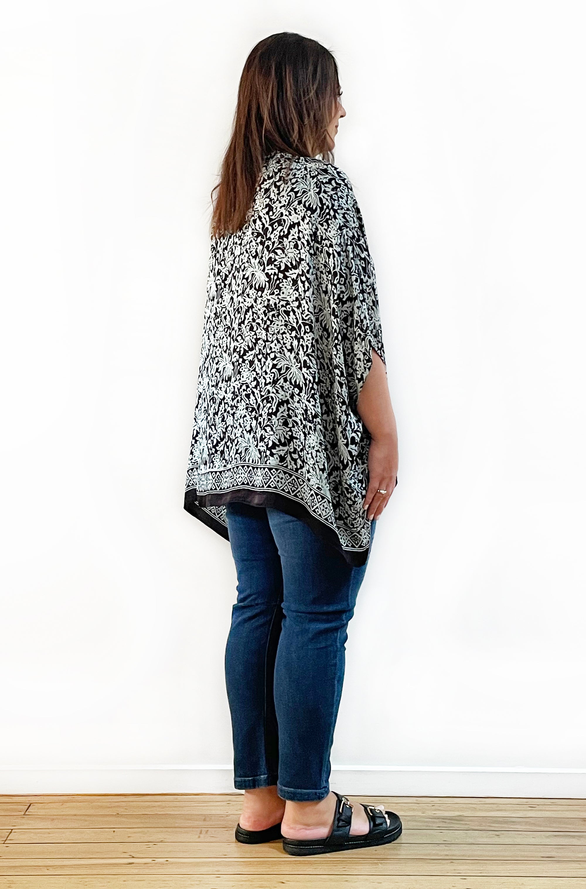 SILK PONCHO IN SOFT SAGE AND BLACK FLORAL PRINT