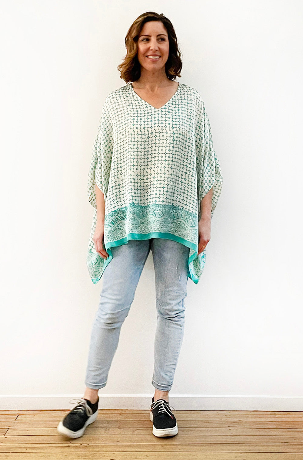 SILK PONCHO IN LIGHT TEAL AND IVORY PRINT