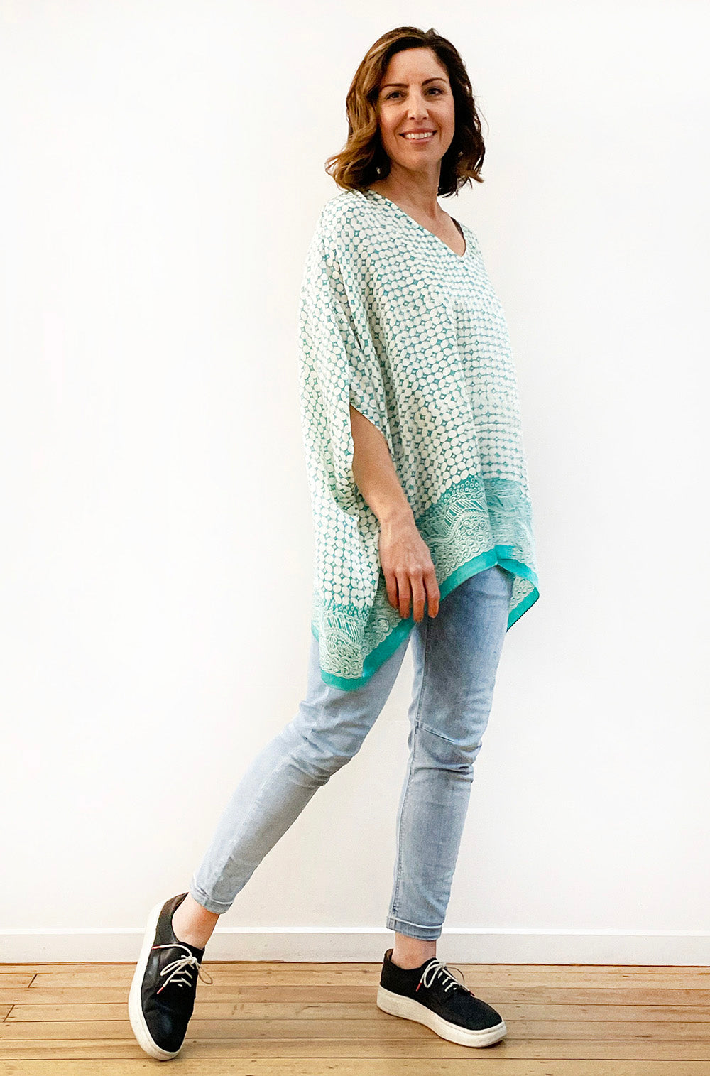 SILK PONCHO IN LIGHT TEAL AND IVORY PRINT